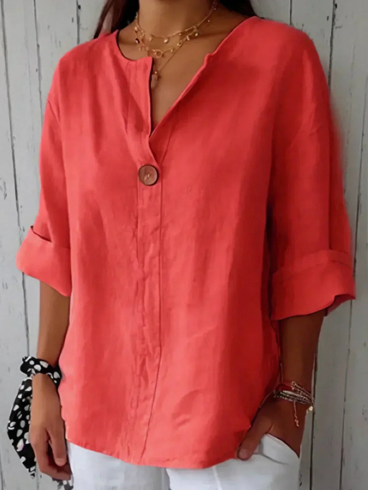 Blusa larga con cuello en V