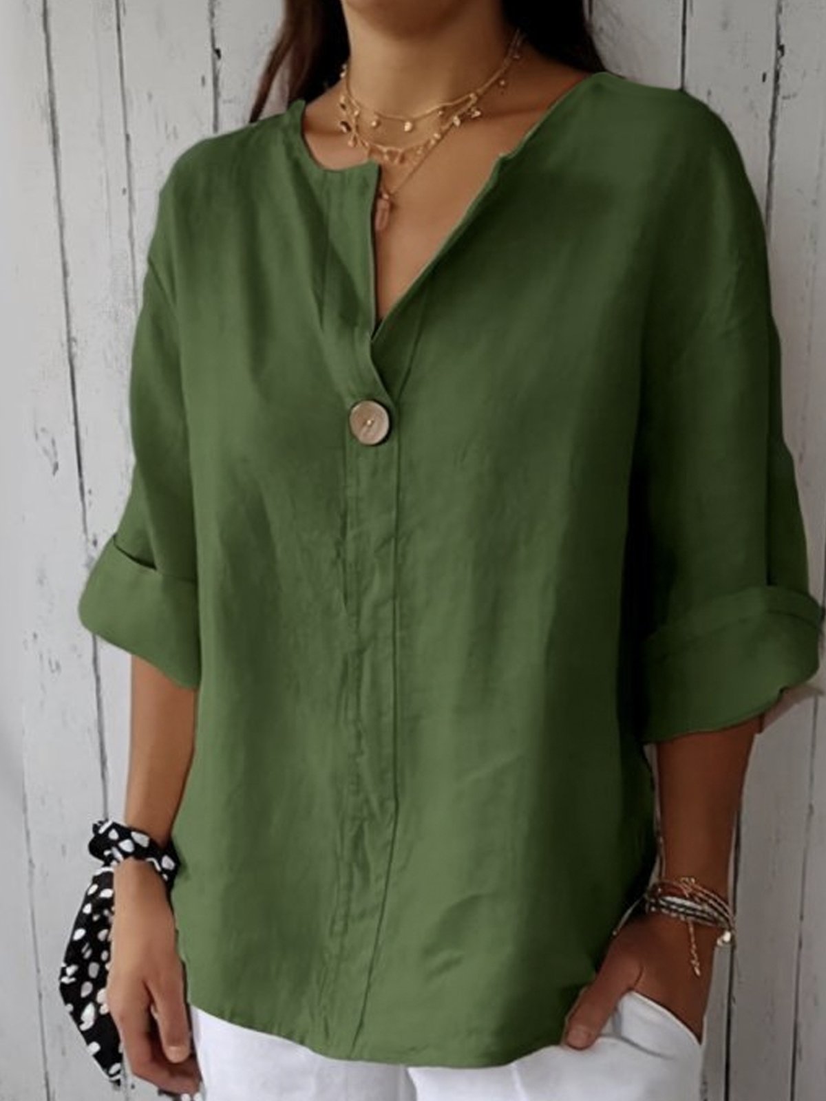 Blusa larga con cuello en V