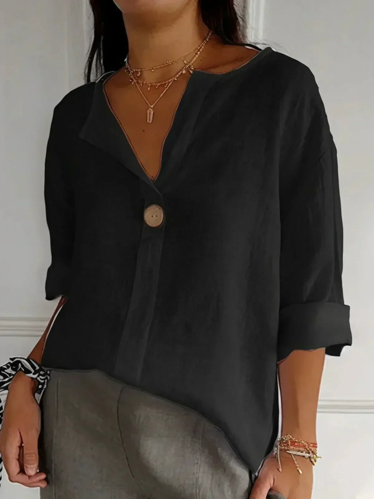 Blusa larga con cuello en V