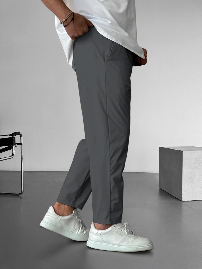Elegantes pantalones ajustados con cordón