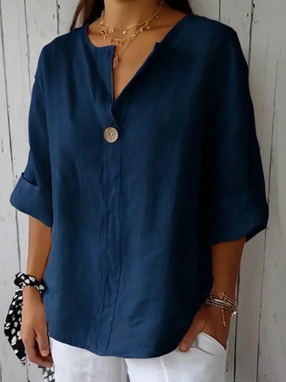 Blusa larga con cuello en V