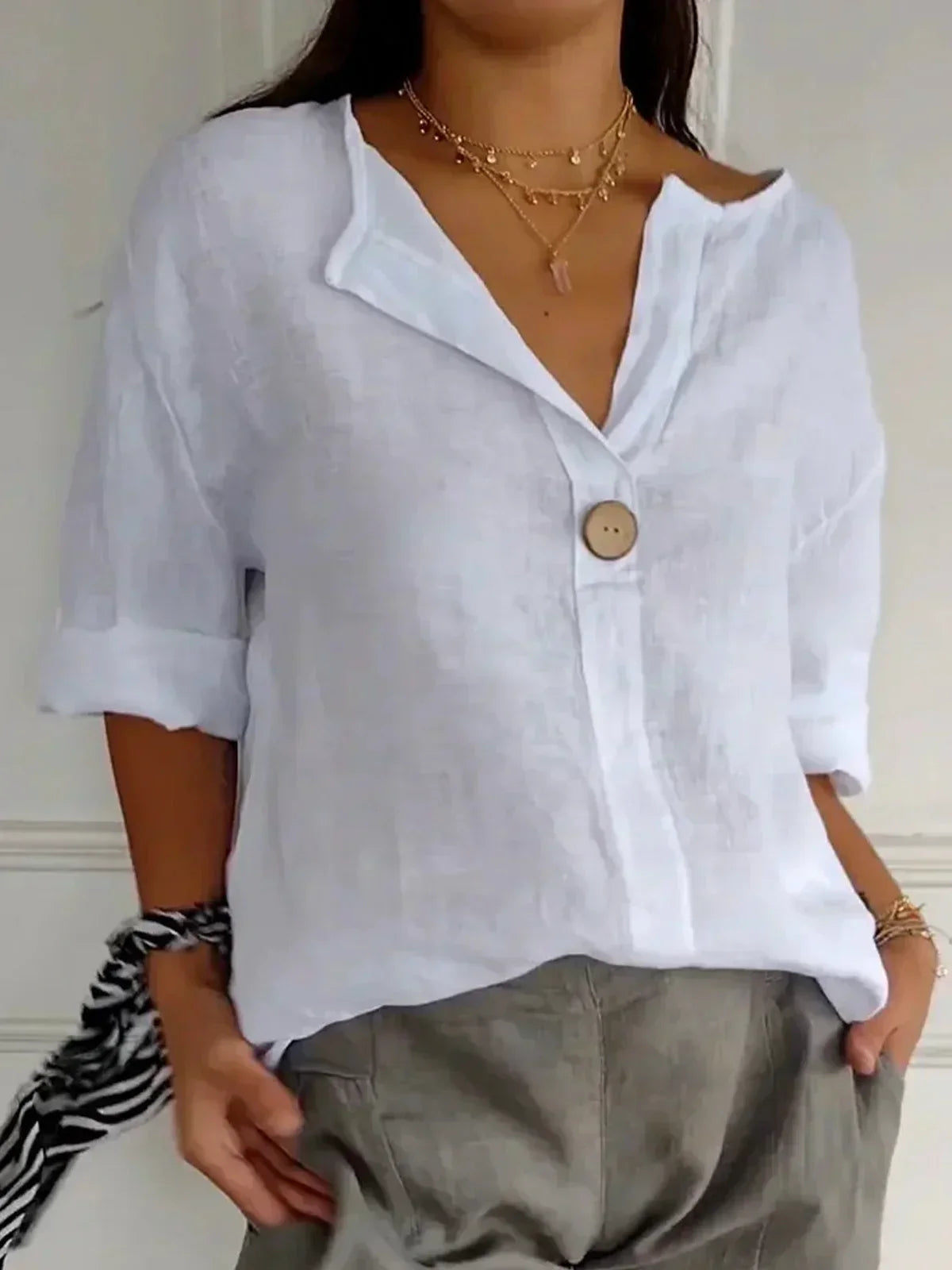 Blusa larga con cuello en V